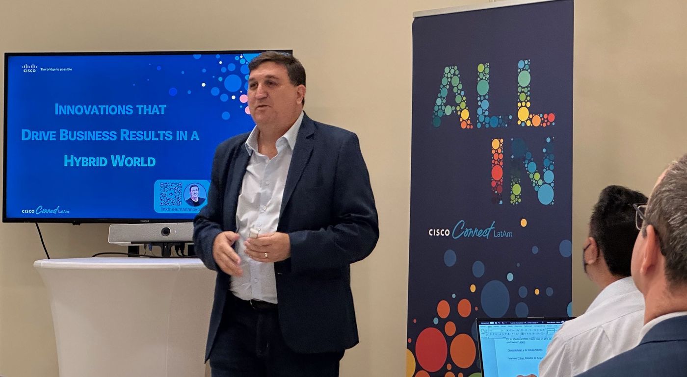 Mariano presenting at Cisco Connect LatAm next to a slide titled Innovations that drive business results in a hybrid world